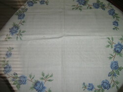 Beautiful blue rose tablecloth embroidered with tiny cross stitches