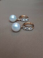 Gold-plated pearl earrings set with zircons