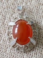 Filigree silver pendant with amber stones