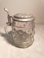 Beer mug with a glass body, protruding material, whose tin lid also has a convex pattern. Marked bmf.