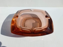 Thick mauve colored glass ashtray