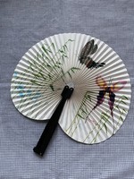 Folding small Chinese paper fan with beautiful patterns