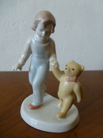 Little girl with a teddy bear in Aquincum, little girl walking with a teddy bear
