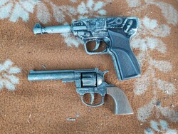 Old cartridge metal toy pistols