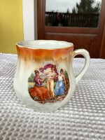 A spectacular Zsolnay porcelain mug with a belly.
