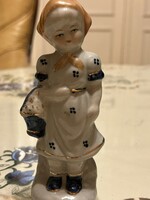 Porcelain girl in a blue dress