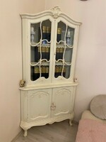 Corner cabinet with showcases