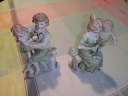 Porcelain mother with small child, in two designs