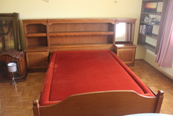 Double bed with overhanging shelf + bedside cabinets