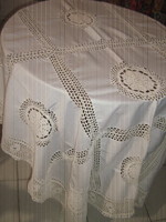 Elegant tablecloth with a beautiful hand-crocheted edge and crochet insert