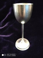 Silver (800 houndstooth) stemmed short drink glass.