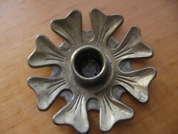 Flower, snowflake-shaped copper candle holder