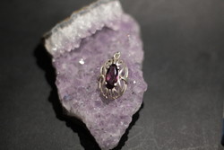 Beautiful silver pendant with purple stones