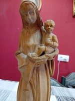 Wooden statue of Mary with her baby