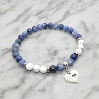 Sodalite and howlite mineral bracelet with stainless steel spacer