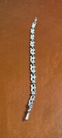 Metal bracelet with rhinestones