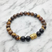 Tiger eye and onyx mineral bracelet with stainless steel spacer