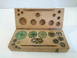 Old antique scale weight set from the 1930s weights from 1 gram to 200 grams