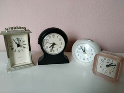 4 clocks in one, 1 travel clock and 3 alarm clocks