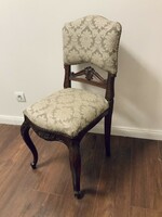 Carved chair with new upholstery