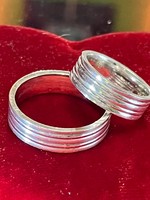 Pair of shiny silver wedding rings