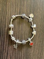 Silver pandora bracelet with many charms