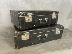 2 old suitcases