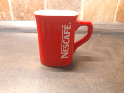 Nescafe mug is smaller