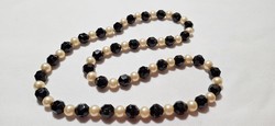 Vintage faceted black glass string of beads with spacers
