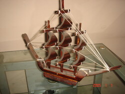 Carved wooden sailboat