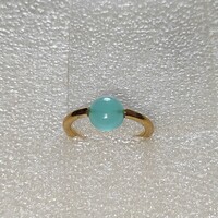 A wonderful gold-plated ring with a mint-colored stone! The stone can be rotated (56)