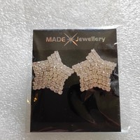 New silver colored crystal earrings
