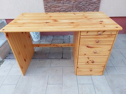A 5-drawer pine desk with pencil holders for sale. Furniture is beautiful, in good condition, without scratches.
