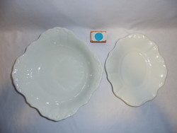 Two old, snow-white bowls with convex patterns - together