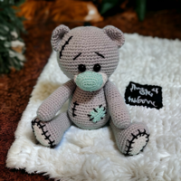 Amigurumi crocheted spotted teddy bear