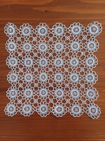 Square crochet doily with small stars