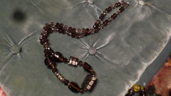 60 Cm necklace made of smoky purple crystal and handmade glass beads.