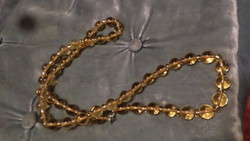 56 cm necklace of honey yellow glass beads.