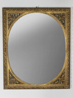 Gilded wood framed mirror with openwork decor