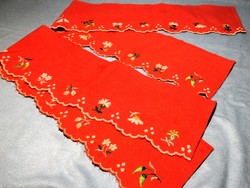 2 red hand-embroidered shelf strips