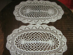 Cute hand crocheted oval light blue tablecloth in a pair