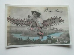 D201714 New Year's photomontage 1910 with an airplane over the city