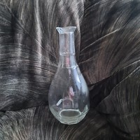 Molded glass bottle, spout