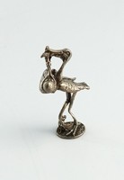 Silver stork with child