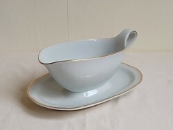Old gold rimmed white glazed German porcelain sauce bowl with sauce pouring saucer