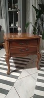 A small dresser with one drawer