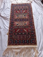 Tunisian silk purple carpet
