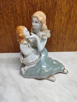 Porcelain mother and daughter