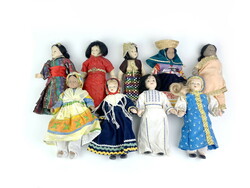 9 dolls with porcelain heads in folk costumes