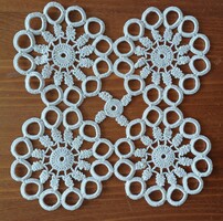 Square crocheted lace tablecloth made of 4 stars